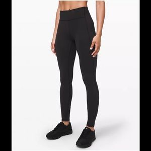 Lululemon black 31in speed up tight size 4
